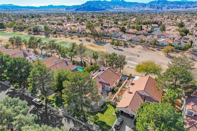 bird's eye view with a residential view and a mountain view