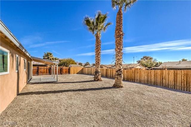 view of yard with a patio area and a fenced backyard