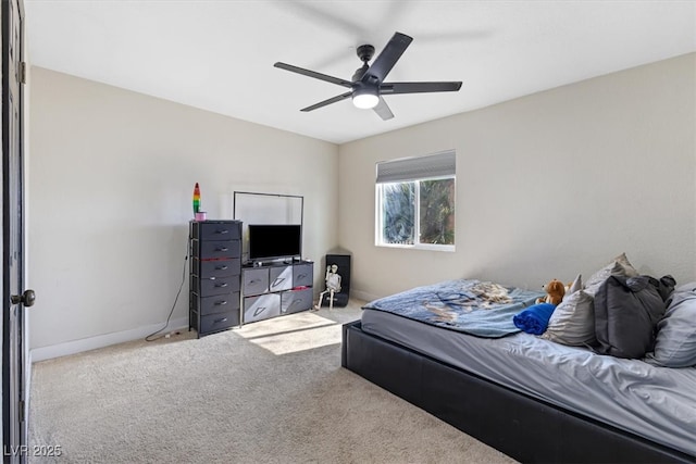 bedroom featuring baseboards, carpet, and a ceiling fan