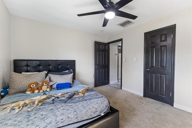 bedroom with visible vents, baseboards, a ceiling fan, and carpet flooring