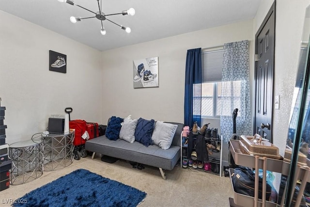 living room featuring an inviting chandelier and carpet