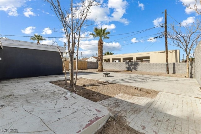 view of yard featuring a fenced backyard and a patio