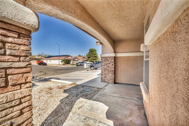 view of patio / terrace with a residential view