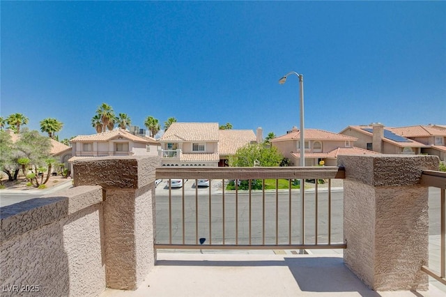 view of gate featuring a residential view