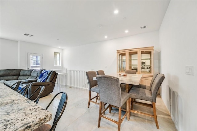 dining space with recessed lighting, visible vents, and light tile patterned floors