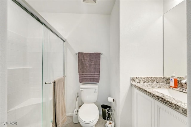 full bathroom with toilet, a stall shower, tile patterned flooring, and vanity