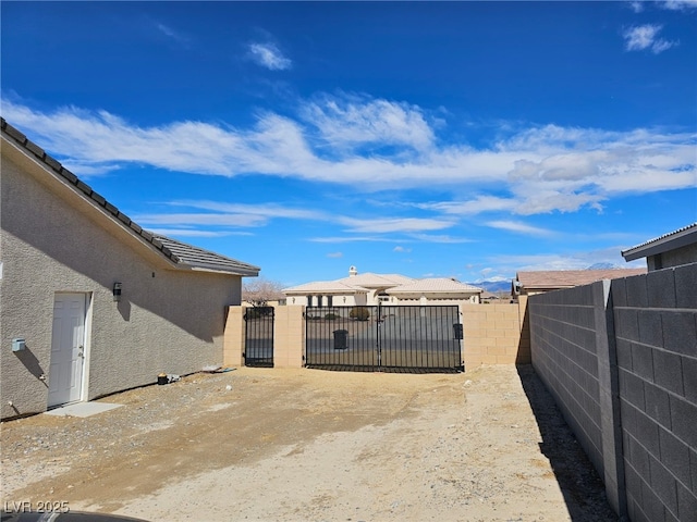 view of yard featuring a gate and fence