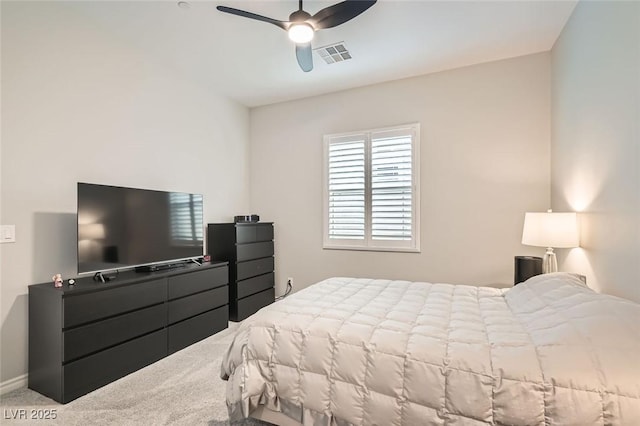 bedroom featuring a ceiling fan, baseboards, visible vents, and carpet flooring