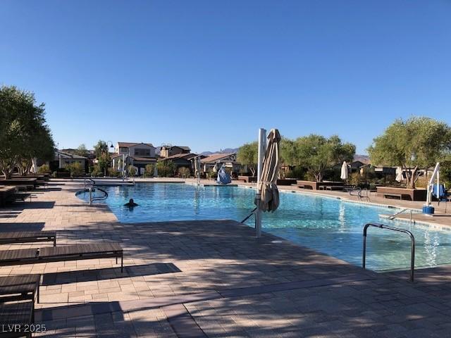 community pool with a patio