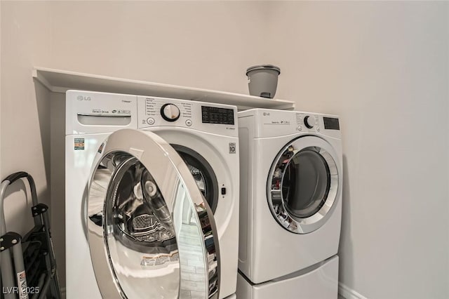 laundry room with laundry area and separate washer and dryer