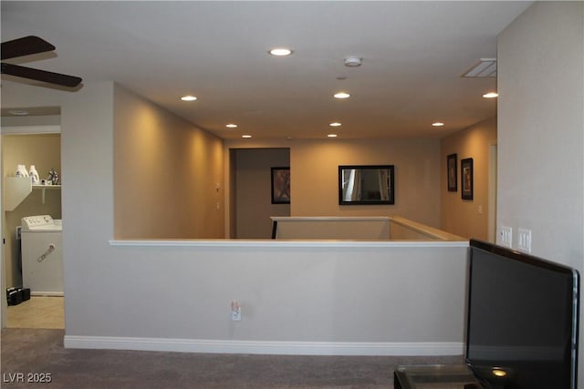 interior space featuring washer and clothes dryer, recessed lighting, visible vents, carpet flooring, and baseboards