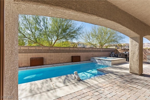 view of pool with a fenced in pool, a fenced backyard, a patio, and an in ground hot tub