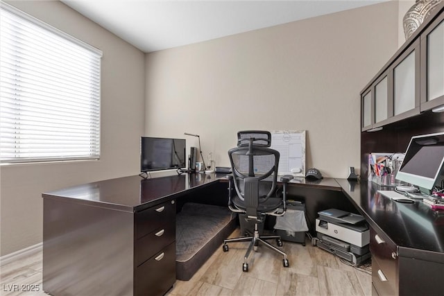 office area featuring baseboards