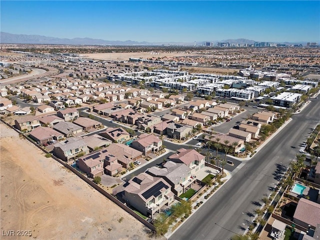 aerial view featuring a residential view and a mountain view