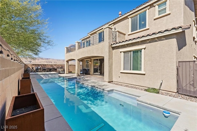 view of pool with a patio area, a fenced backyard, and a fenced in pool