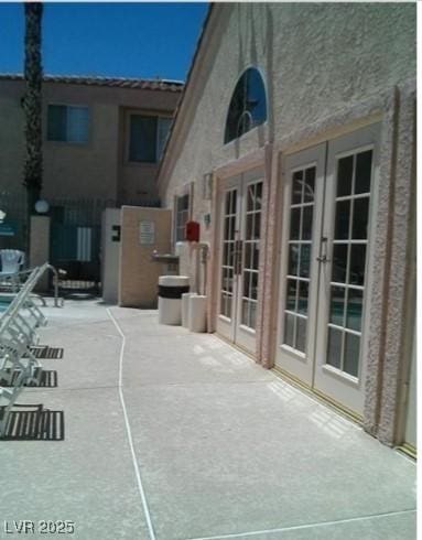 view of patio / terrace featuring french doors