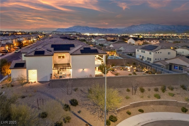 bird's eye view featuring a residential view and a mountain view