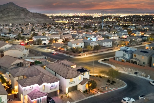 aerial view at dusk with a residential view