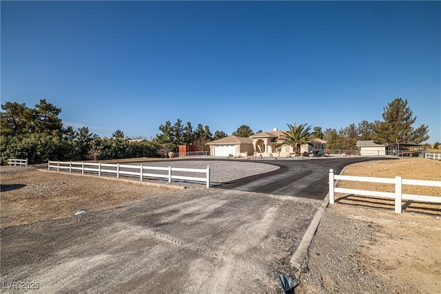view of street with driveway