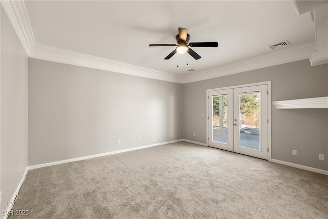 unfurnished room featuring carpet flooring, visible vents, baseboards, and french doors