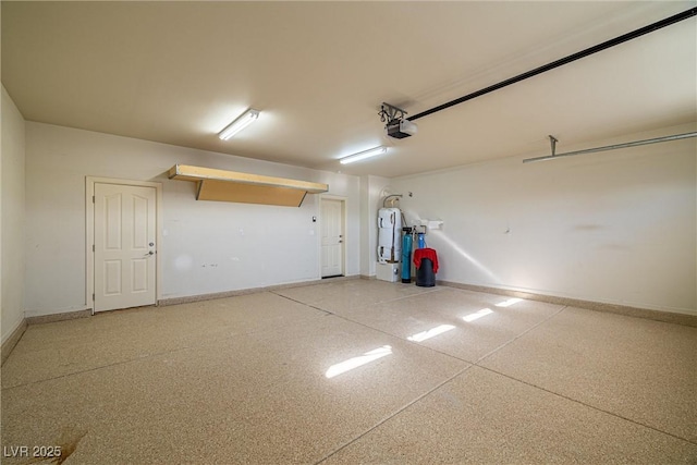 garage featuring water heater, baseboards, and a garage door opener