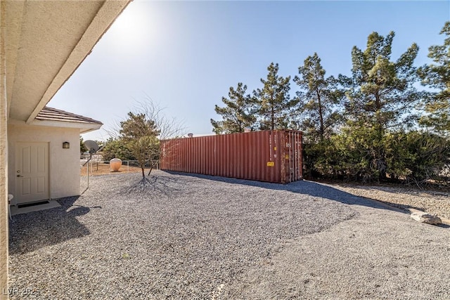 view of yard featuring a gate and fence
