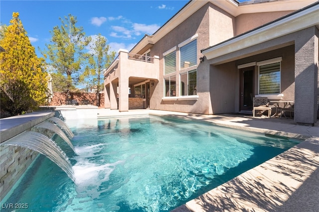 view of pool featuring a patio area and a fenced in pool