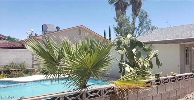 view of pool featuring a fenced in pool and fence