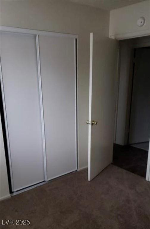 unfurnished bedroom featuring a closet