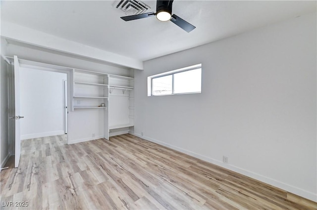 unfurnished bedroom with visible vents, a ceiling fan, baseboards, a closet, and light wood-type flooring