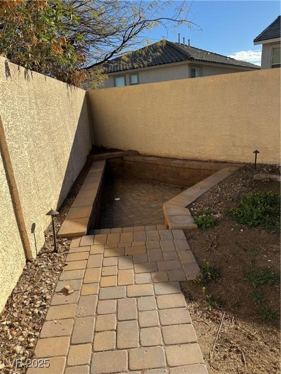 exterior space with a fenced backyard