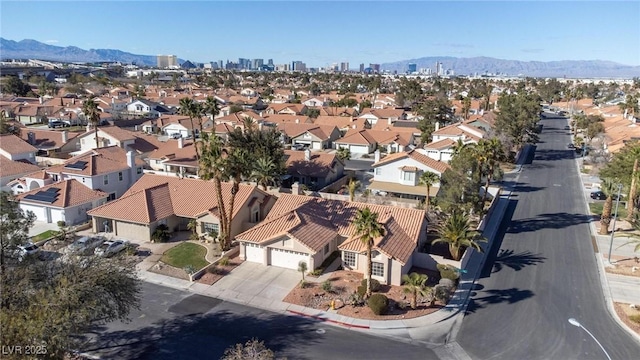 bird's eye view featuring a residential view and a mountain view