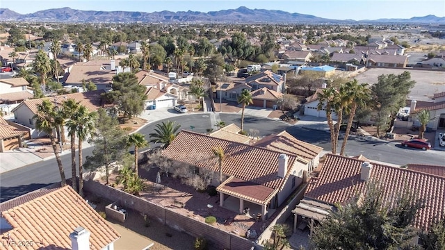 birds eye view of property with a mountain view and a residential view