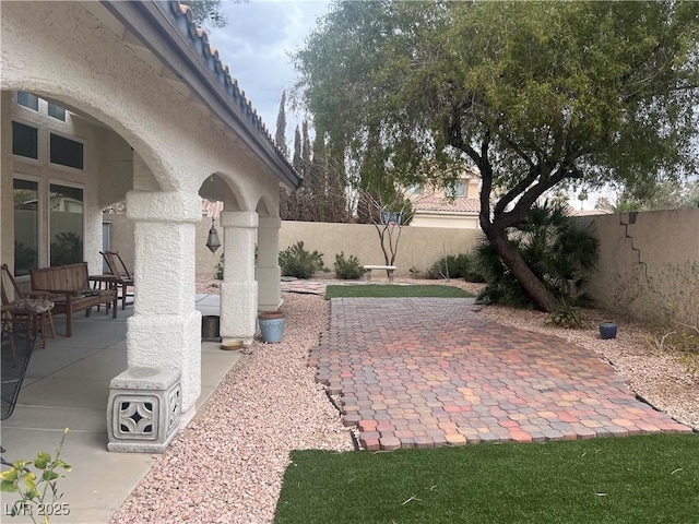 8396 Yamhill St, Las Vegas, NV 89123 - fenced backyard with a patio area