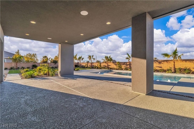 view of patio / terrace featuring a fenced in pool and a fenced backyard