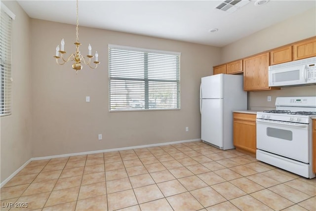 kitchen with a chandelier, white appliances, visible vents, baseboards, and light countertops