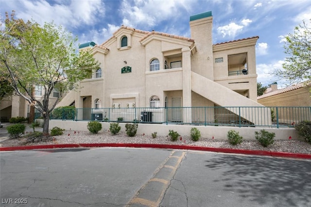 view of property with fence