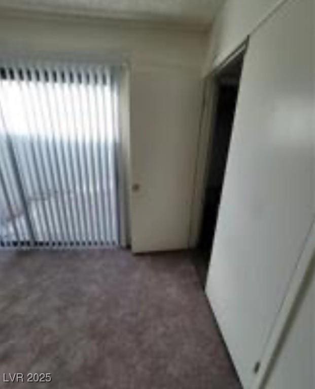 empty room featuring radiator heating unit