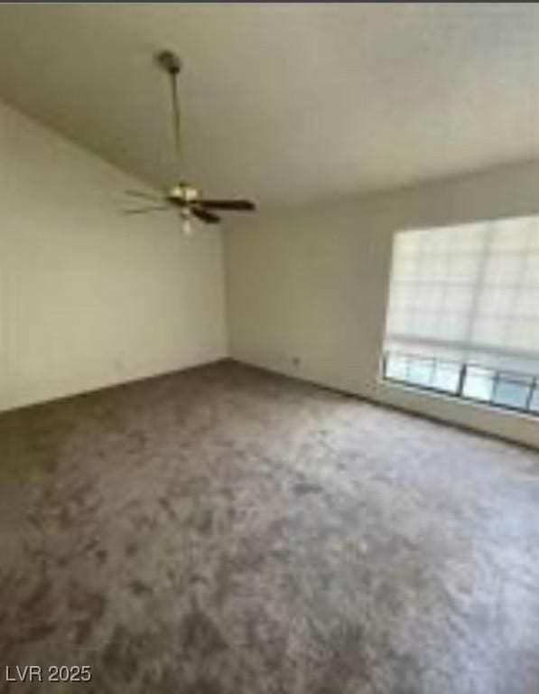 unfurnished living room featuring carpet flooring