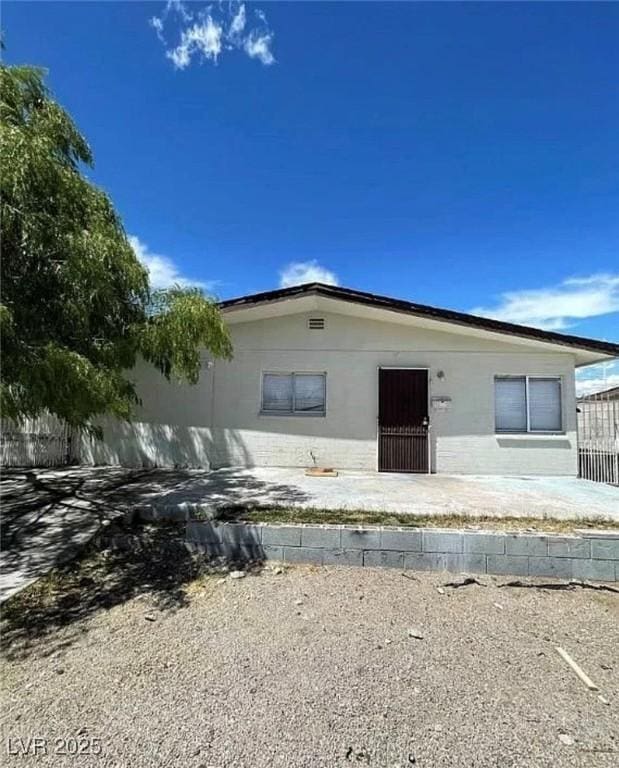 view of front of home with fence