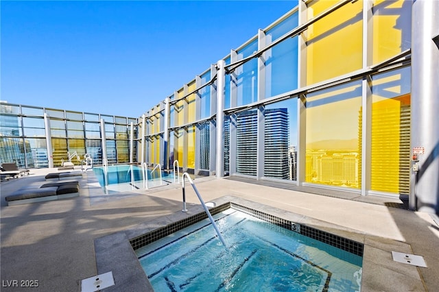 pool with a patio area