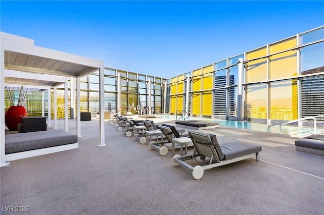 view of patio featuring a community pool