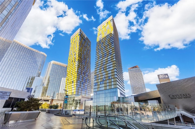 view of building exterior featuring a view of city