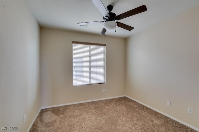 unfurnished room with carpet flooring, ceiling fan, visible vents, and baseboards