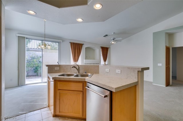 kitchen featuring recessed lighting, light colored carpet, a sink, light countertops, and dishwasher