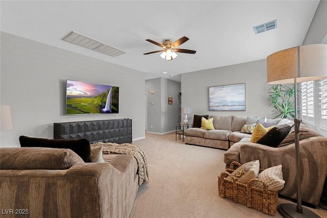 living room with a ceiling fan, baseboards, visible vents, and carpet flooring