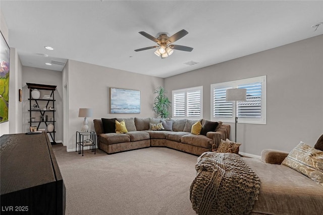 living area featuring recessed lighting, visible vents, a ceiling fan, carpet flooring, and baseboards