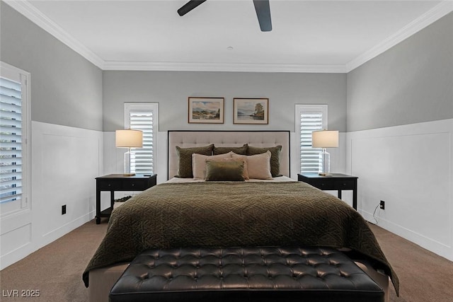 bedroom featuring ornamental molding, multiple windows, and carpet