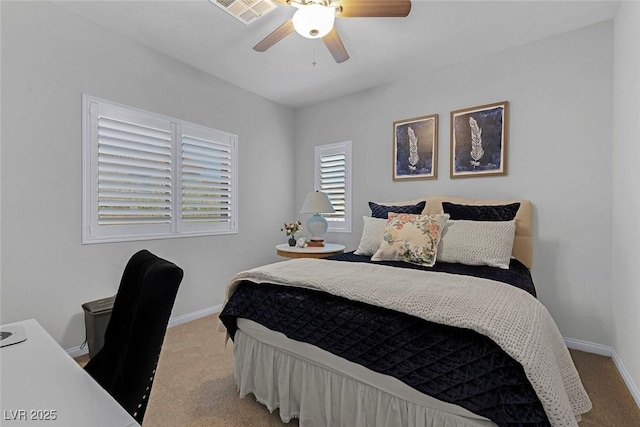 bedroom with carpet floors, visible vents, baseboards, and a ceiling fan