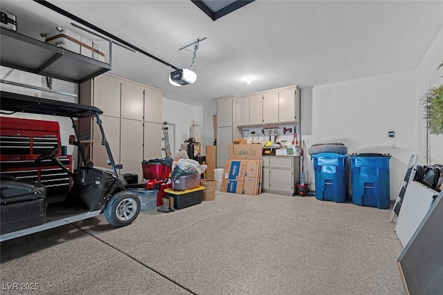 garage featuring a garage door opener